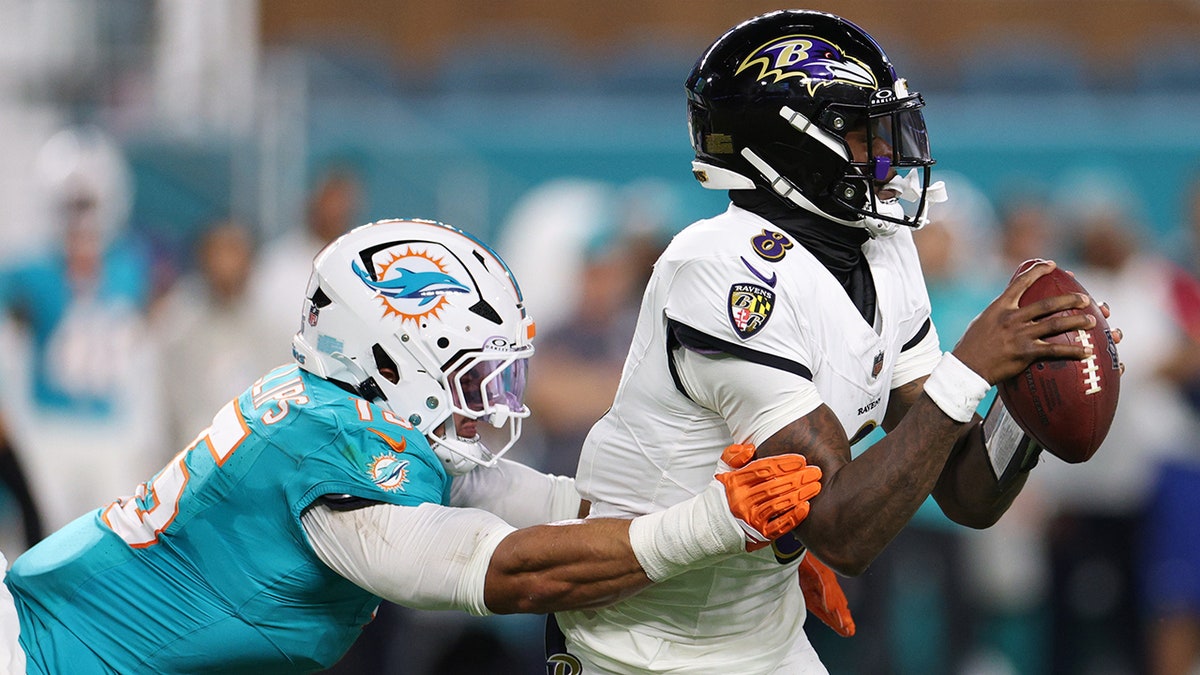 Jaelan Phillips gets to Lamar Jackson