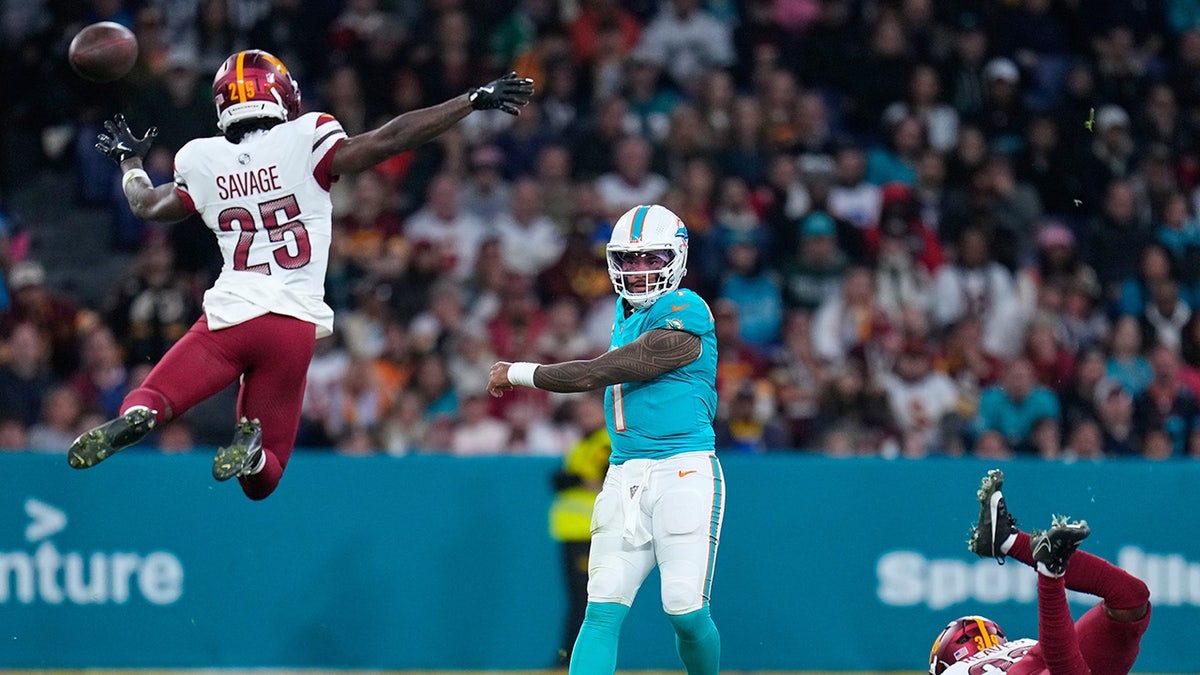 Darnell Savage tries to stop a pass