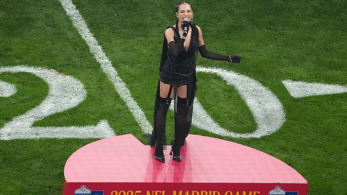 US national anthem singer for NFL's Spain game sparks debate over outfit choice at george magazine
