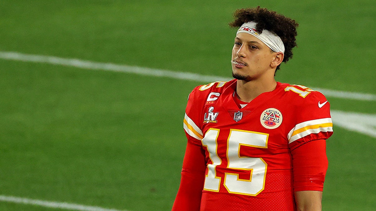 Patrick Mahomes looks on before a game