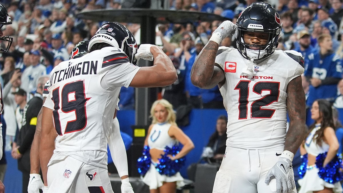 Nico Collins celebrates a TD