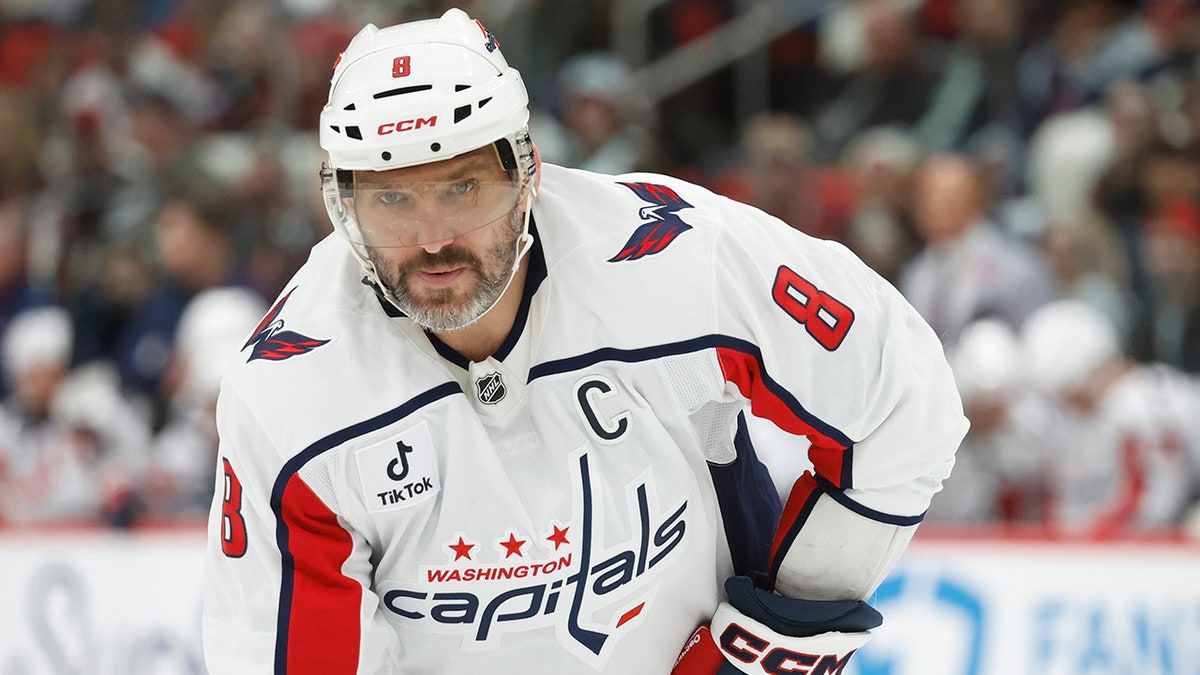 Alex Ovechkin looks on vs Hurricanes