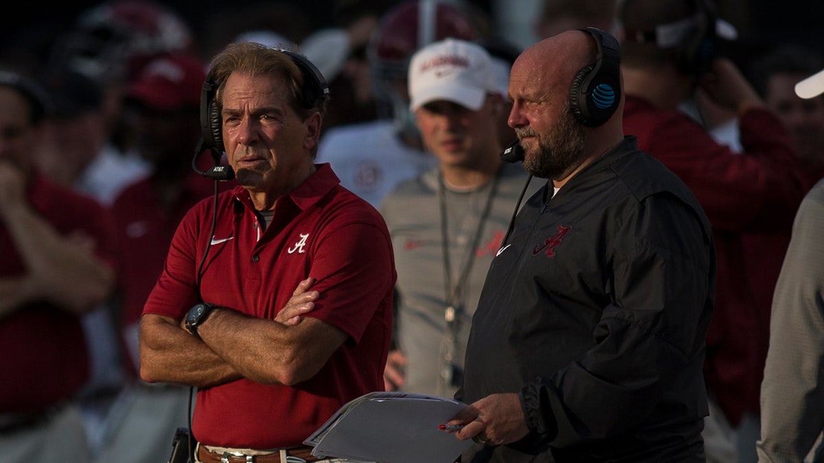 Nick Saban and assistant coach Brian Daboll during a college football game