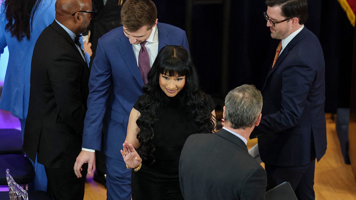 Nicki Minaj speaking to people at the UN