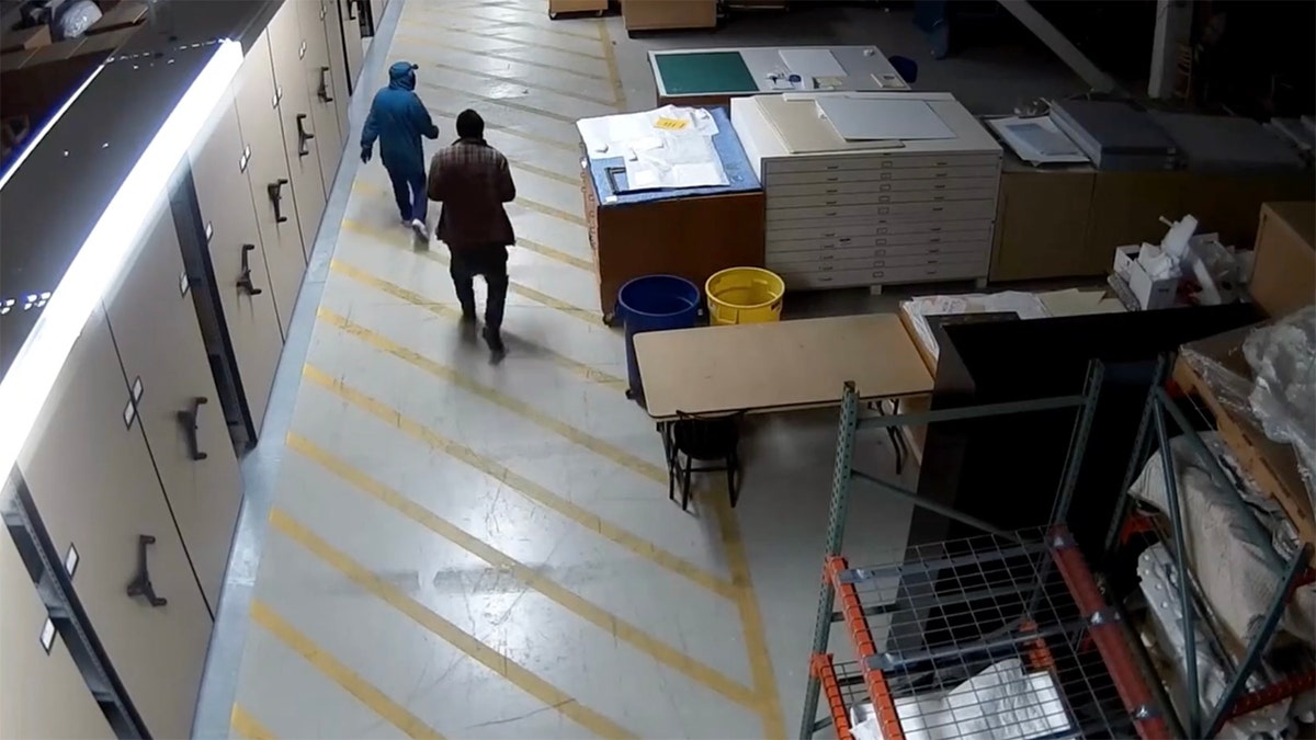 Surveillance footage of suspects allegedly stealing artwork from the Oakland Museum of California