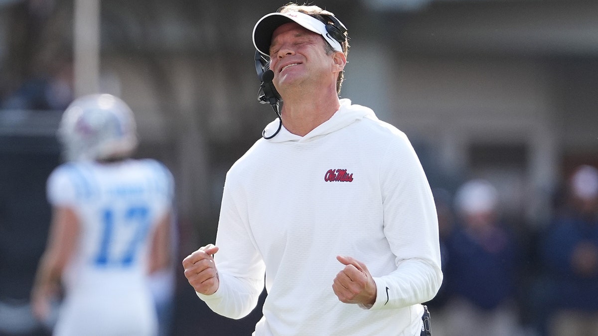 Lane Kiffin coaches in the Egg Bowl