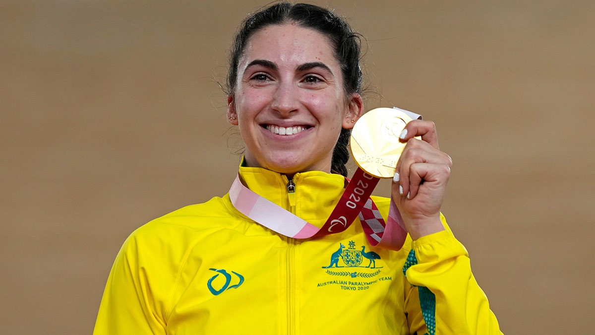 Paige Greco holds a gold medal