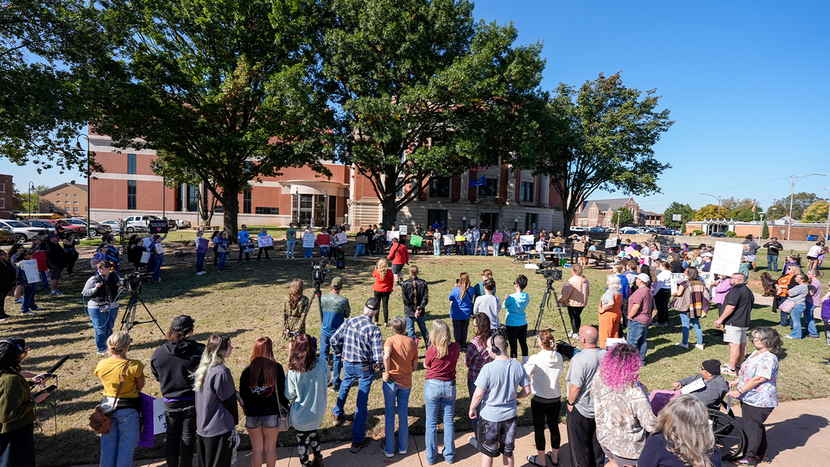 Crowd gathers outside Payne County Courthouse