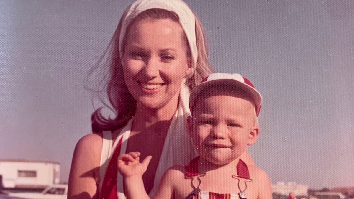 Peggy Crosby holding a young Phil Crosby Jr
