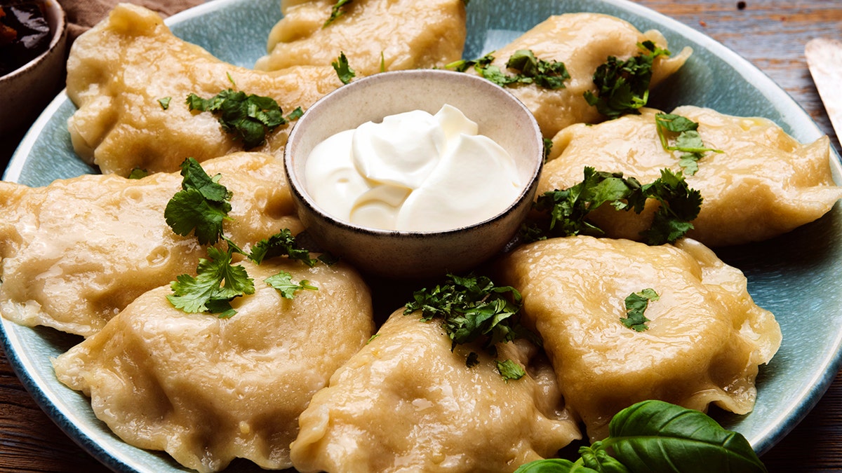 Pierogis on a plate looking delicious.