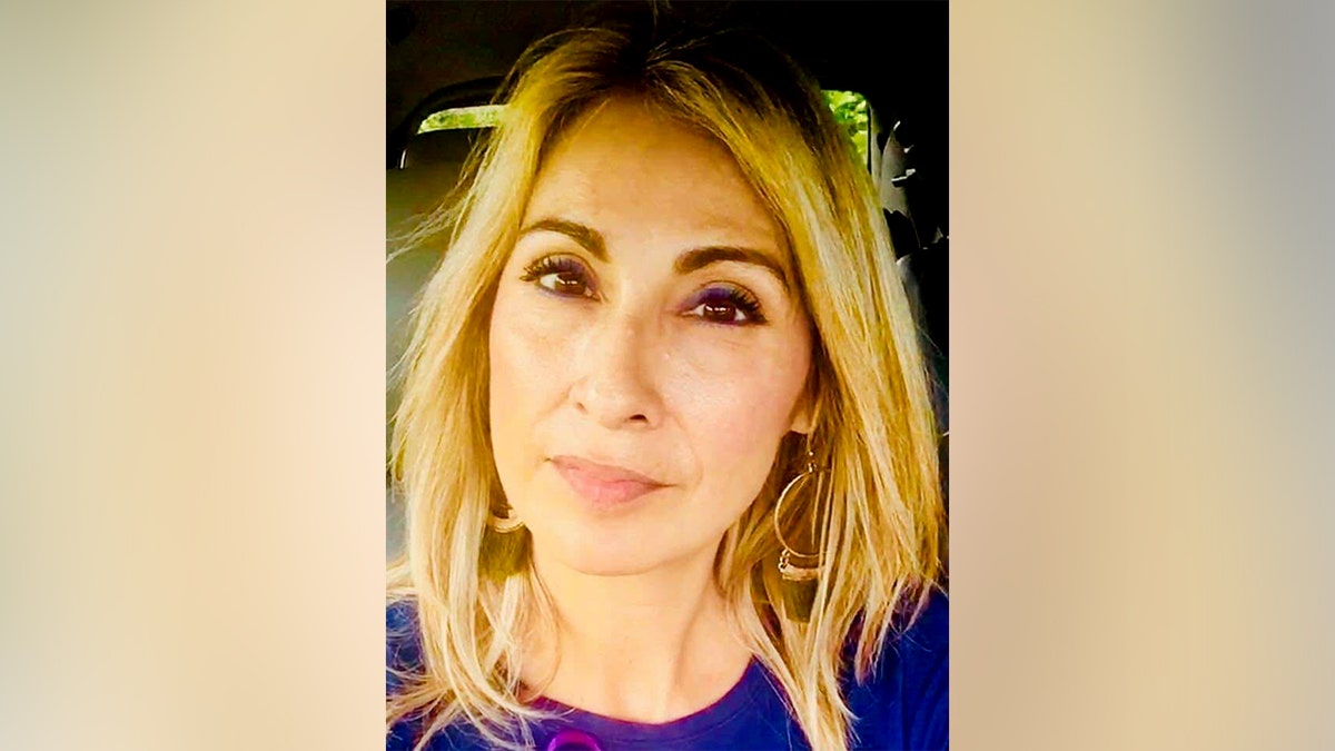 Jeannot Plessy poses for a picture in a car