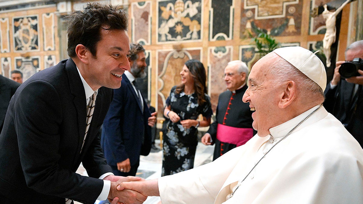Pope Francis meets comedian Jimmy Fallon at the Apostolic Palace during an audience with artists from around the world.