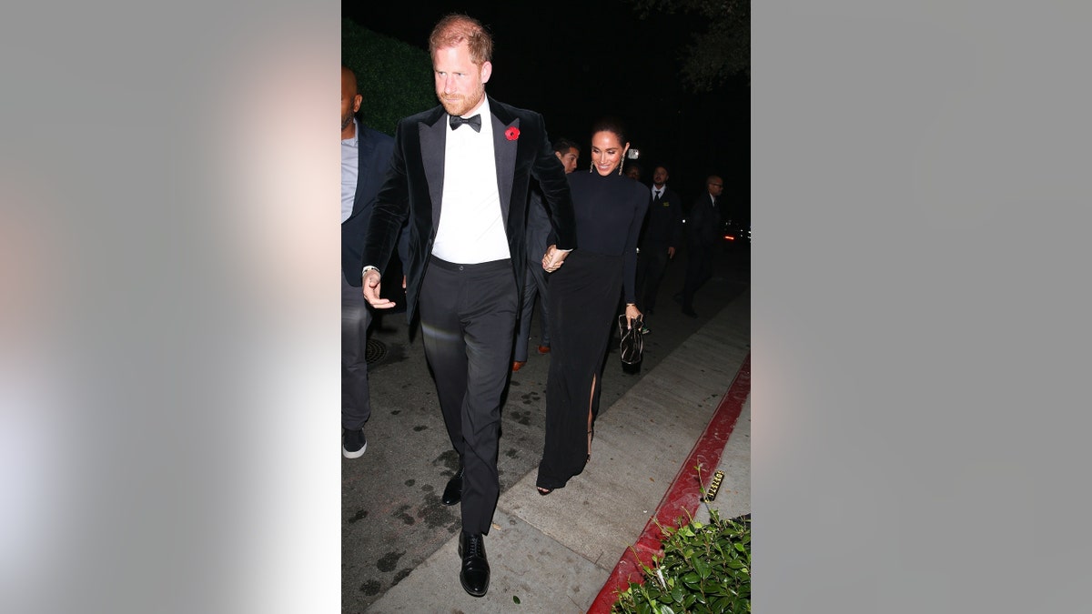 Prince Harry escorting Meghan Markle to Kris Jenner's birthday party.