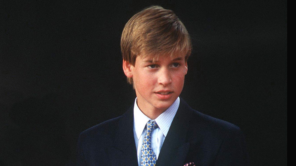 A young Prince William looking serious.