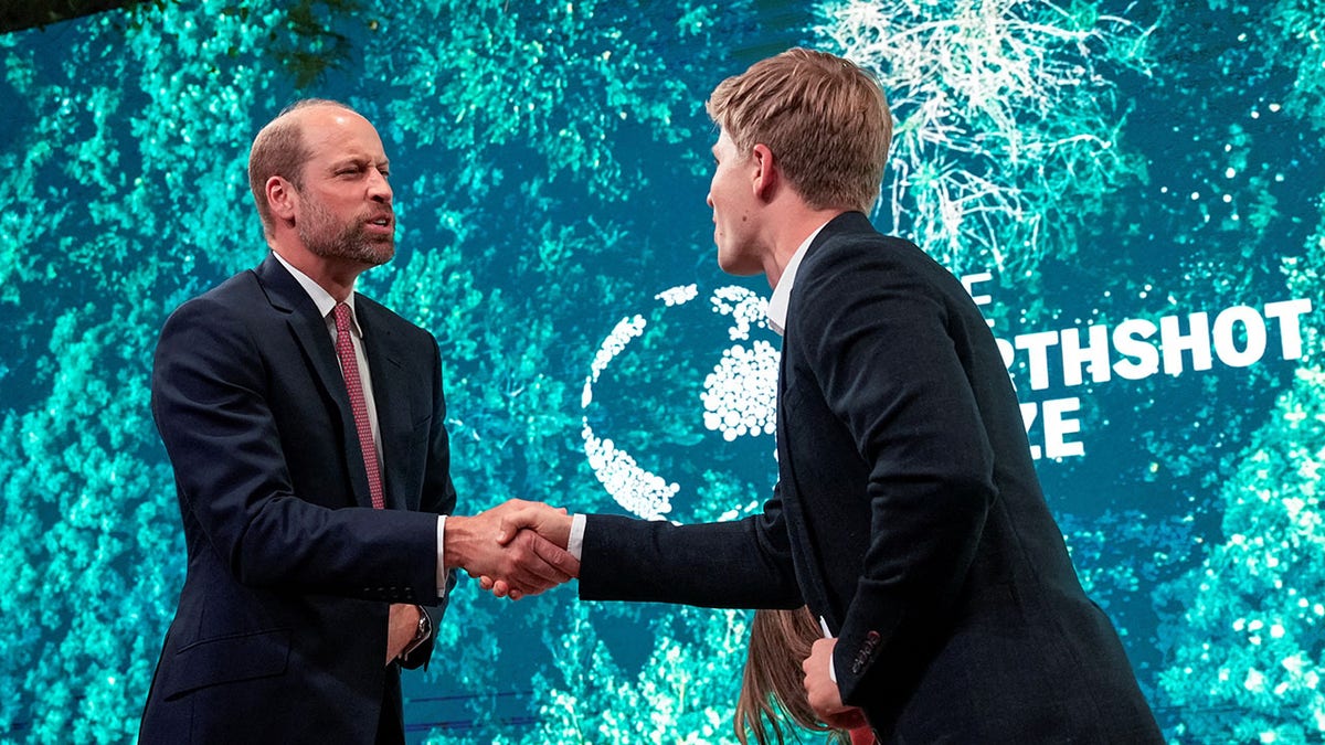Robert Irwin and Prince William shaking hands at the Earthshot Prize