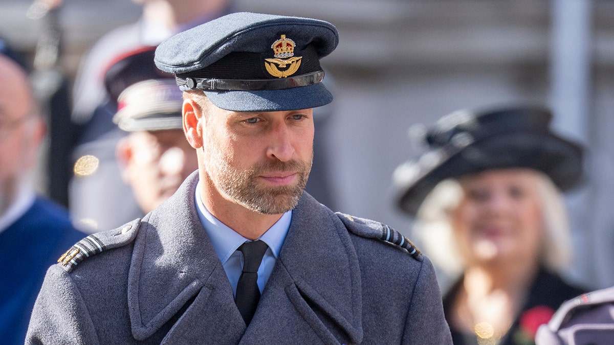 Prince William in uniform looking somber on Remembrance Day.