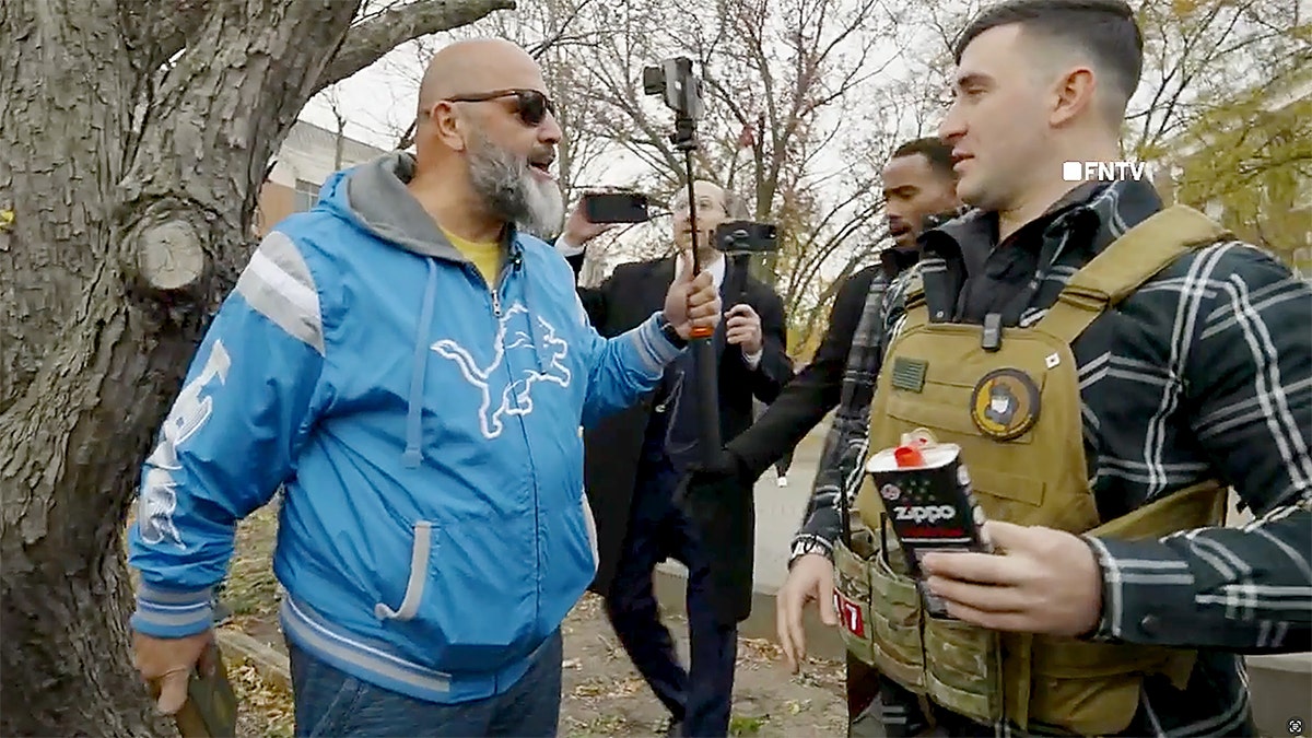 Two protesters confront each other in Dearborn, Michigan