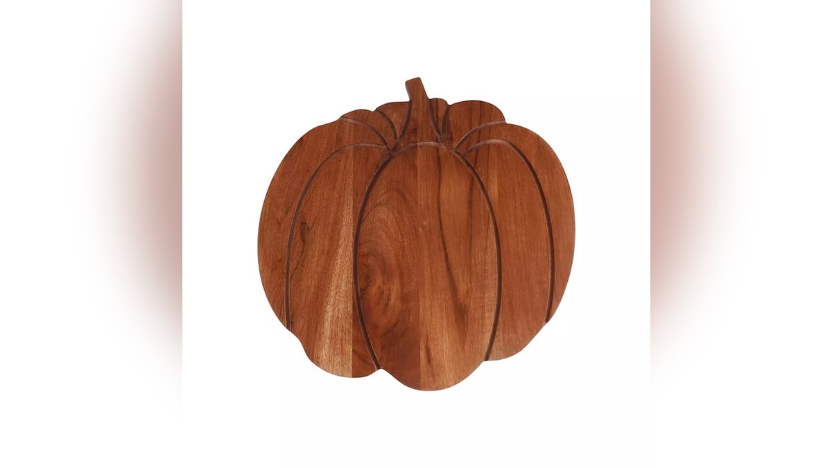 Add fall flair to your table with this pumpkin-shaped serving board.
