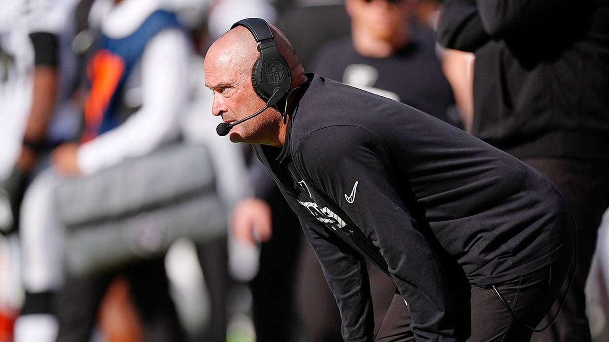 Tom McMahon looks on