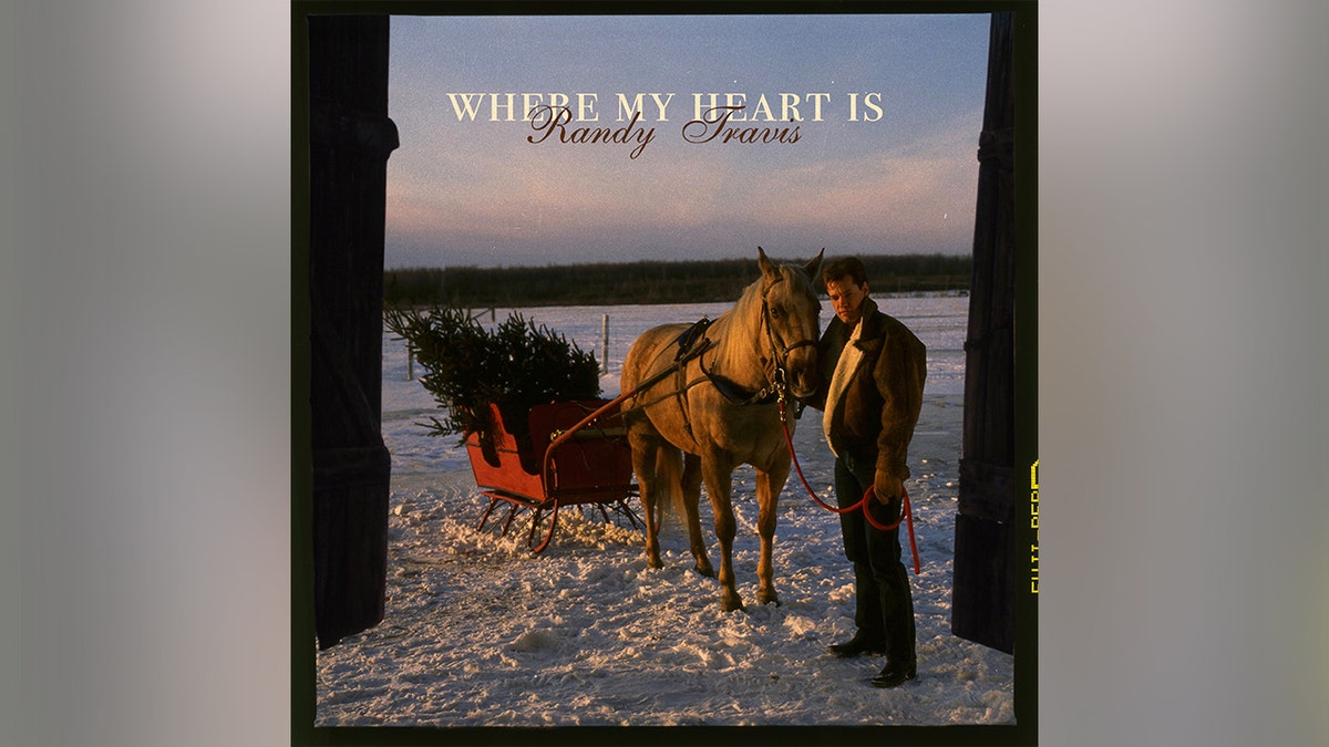 Randy Travis with a horse on the cover art for his new single, "Where My Heart Is."