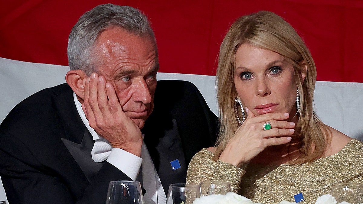 Robert F. Kennedy Jr. and Cheryl Hines sit together at event