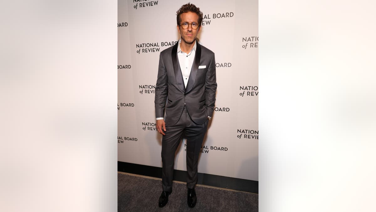 Ryan Reynolds at an event in a suit