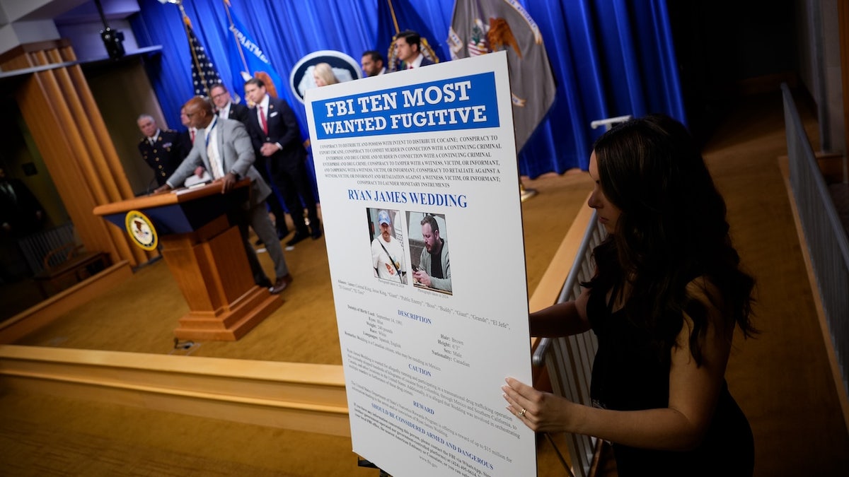 Poster announcing the indictment of a former Olympic snowboarder Ryan Wedding