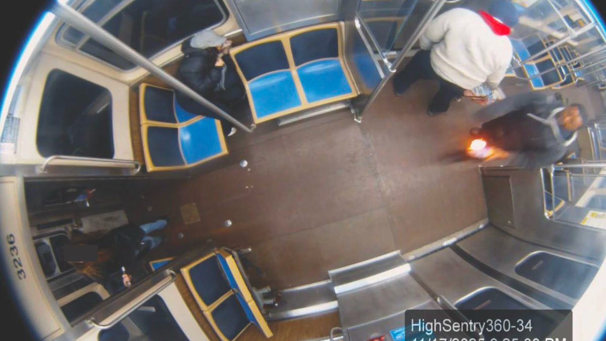 A photo from train security footage showed the suspect allegedly following the woman to the back of the train car before lighting her on fire.