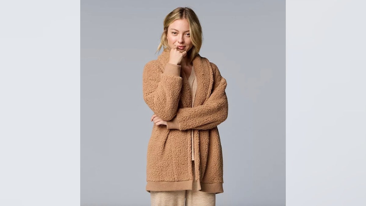 Stay lounging this winter in this sherpa cardigan.