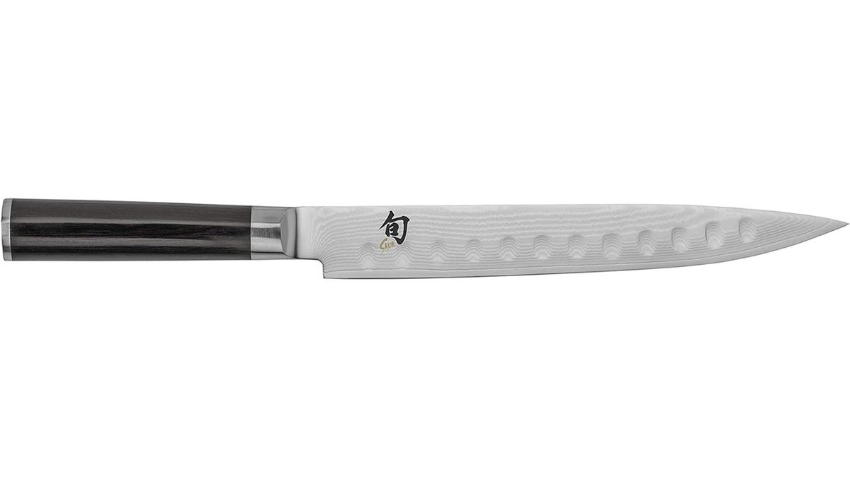 Shun’s smaller knife is easy to use and has a unique frictionless design.