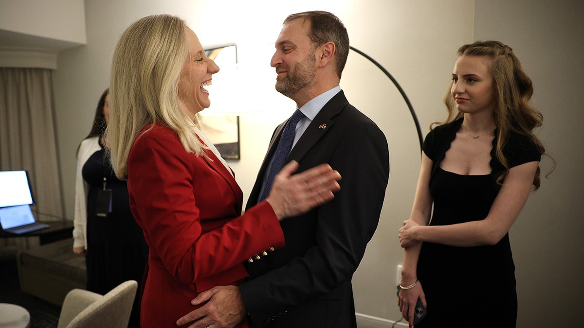 Virginia Democratic gubernatorial candidate, former Rep. Abigail Spanberger embraces her husband Adam after being declared the winner of the Virginia Governor race