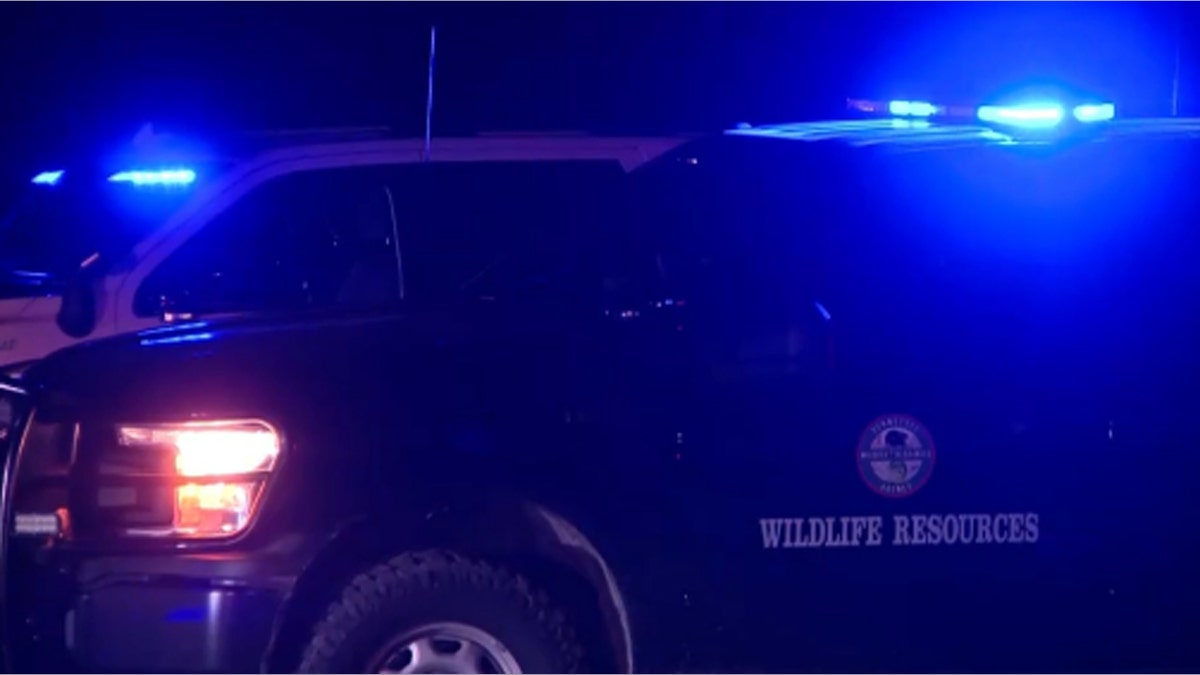 Emergency vehicles at the scene of a helicopter crash