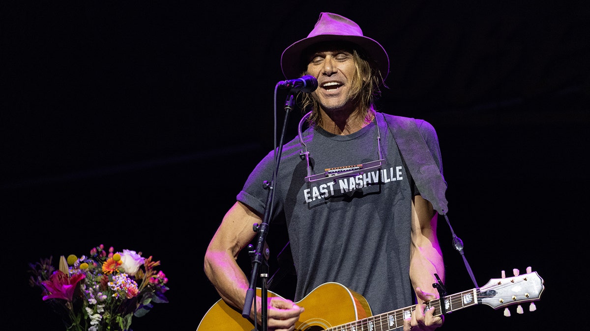 Todd Snider wears East Nashville shirt on stage