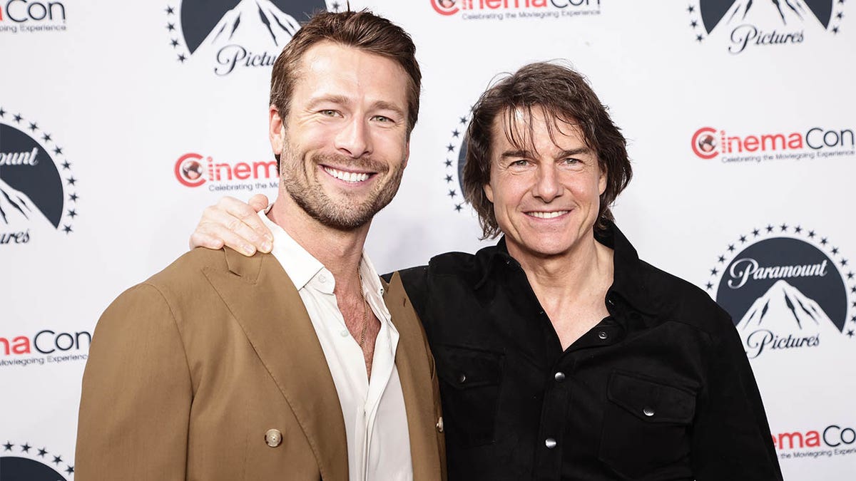 Tom Cruise and Glen Powell on a red carpet in 2025. 