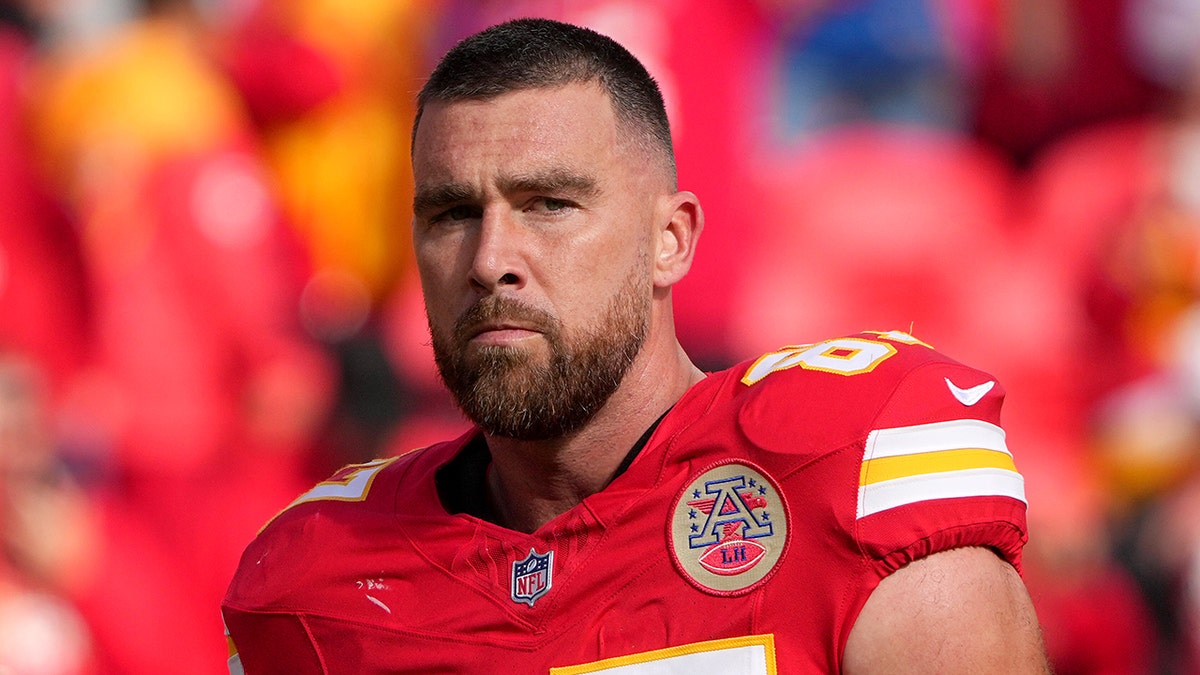 Travis Kelce looks on