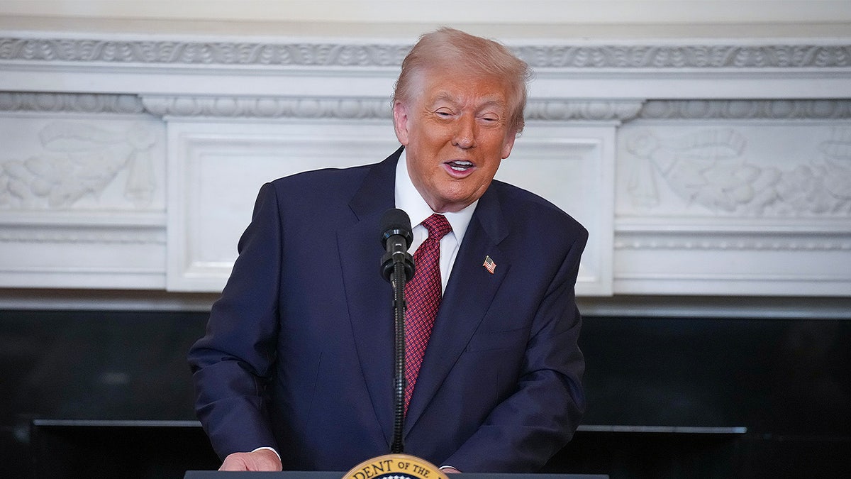 Trump at a White House podium