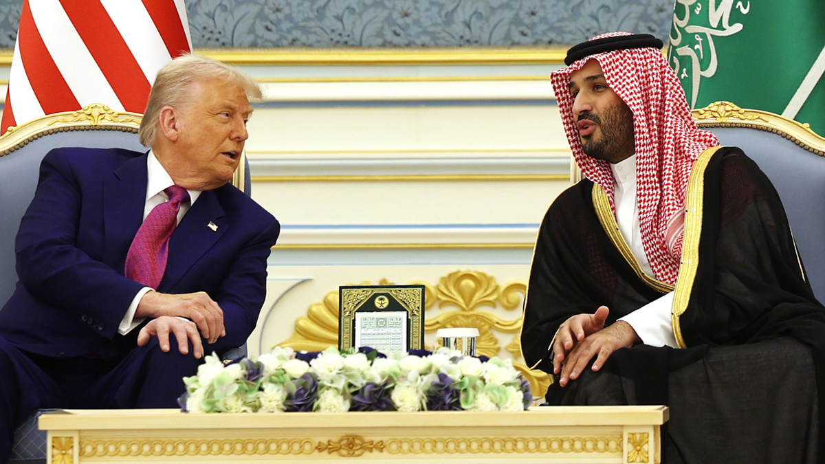 U.S. President Donald Trump is seen speaking with Saudi Crown Prince Mohammed bin Salman during a visit to Riyadh in May 2025.