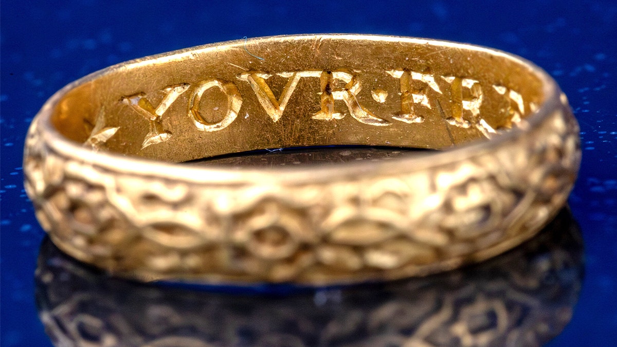 Engraved on gold band