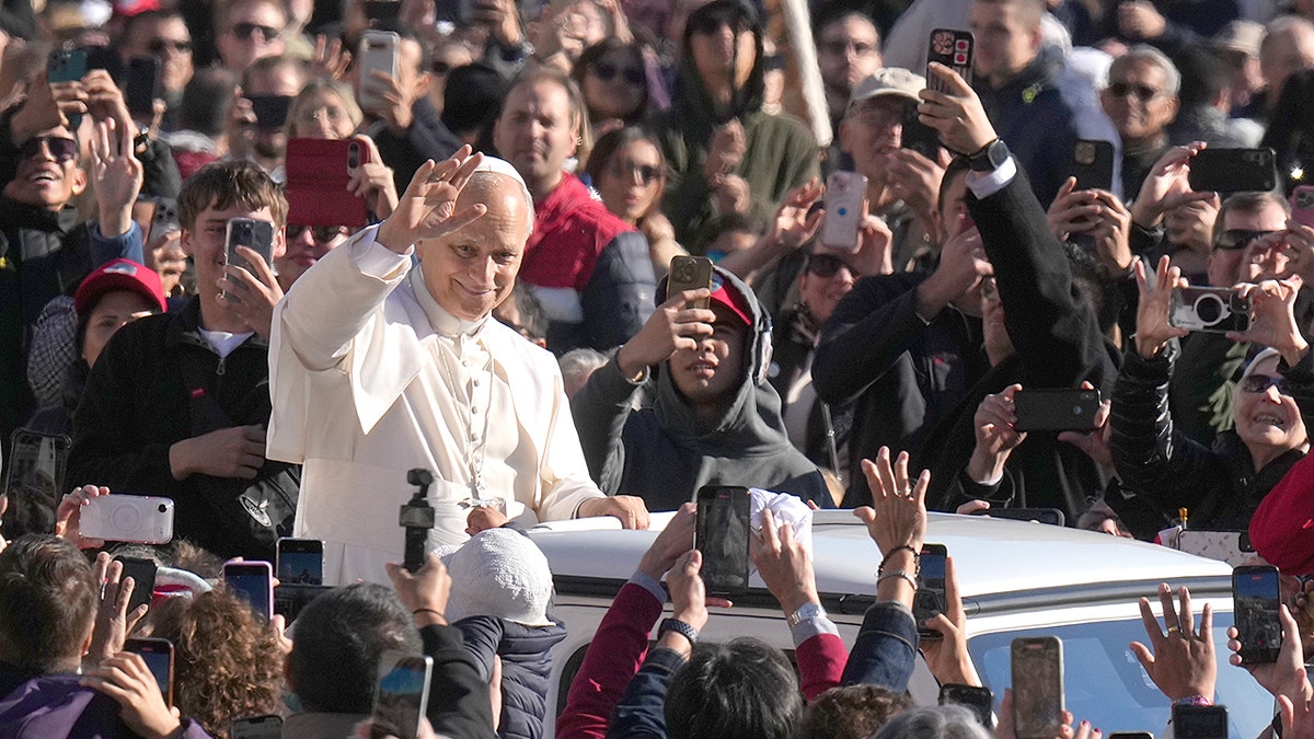 Pope Leo XIV greeting the public at Vatican City