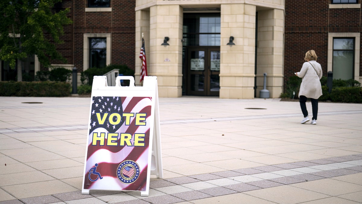 Voters walks into New Jersey polling place