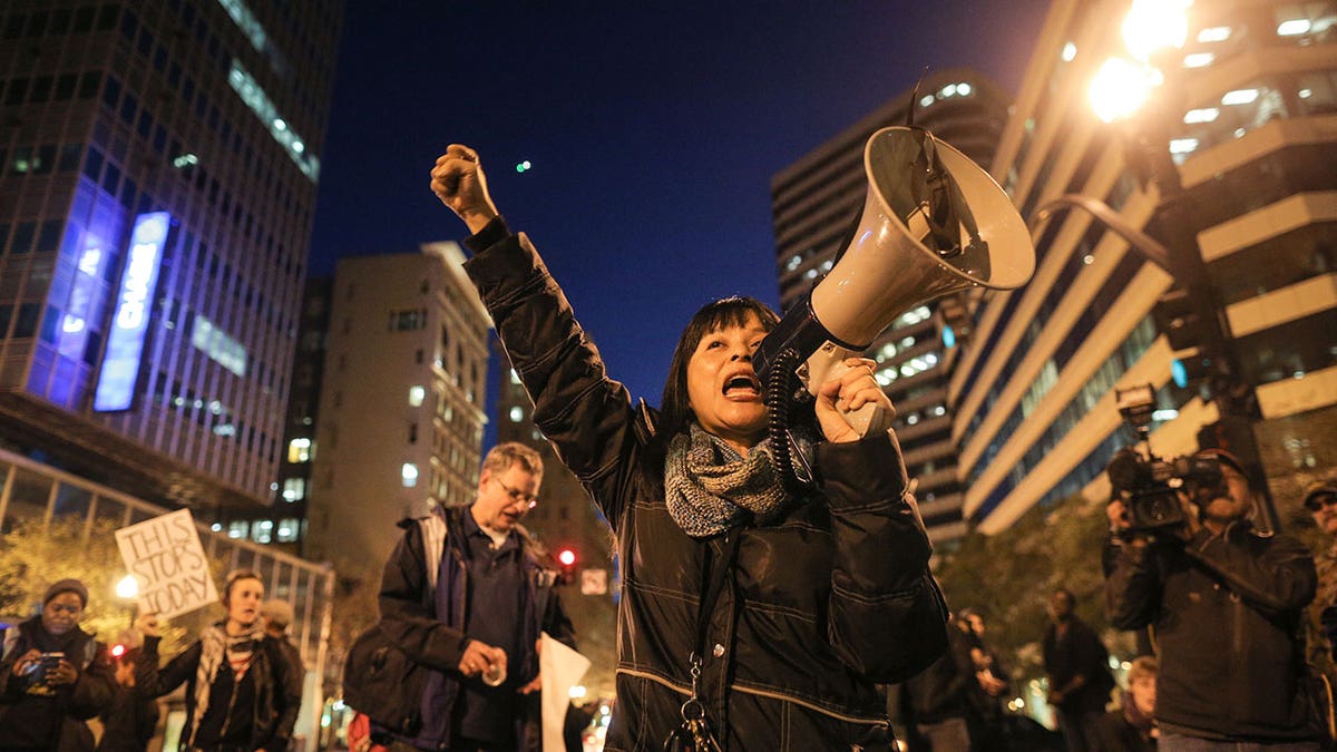 Yvette Felarca speaks to the crowd on the second night of demonstrations following a Staten Island, New York grand jury's decision not to indict a police officer in the chokehold death of Eric Garner on December 4, 2014 in Oakland, California.