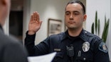 Alhambra police officer Alec Sanders swearing in