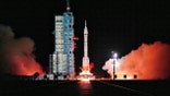 rocket carrying Shenzhou-21 launches