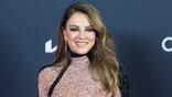 Elizabeth Hurley in a black and cream sequin gown