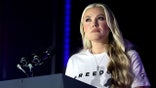 Erika Kirk speaks on stage at a Turning Point USA event at the University of Mississippi.
