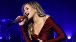 Singer Kelsea Ballerini performing at an event in Chicago.