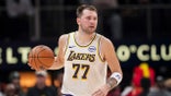 Luka Doncic dribbles ball