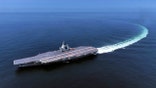 In this photo released by Xinhua News Agency, China's third conventionally powered aircraft carrier, the Fujian, conducts a maiden sea trial on May 7, 2024.