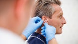 Man hearing loss