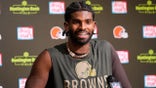 Shedeur Sanders talks to reporters